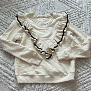 The great. Cream Sweater with Black Ruffle Trim